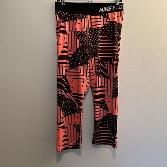 Nike Pro Dri-FIT Women's Peach Abstract Cropped Workout Leggings - Picture 1 of 5